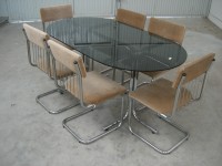 conjunto mesa y sillas 700 €